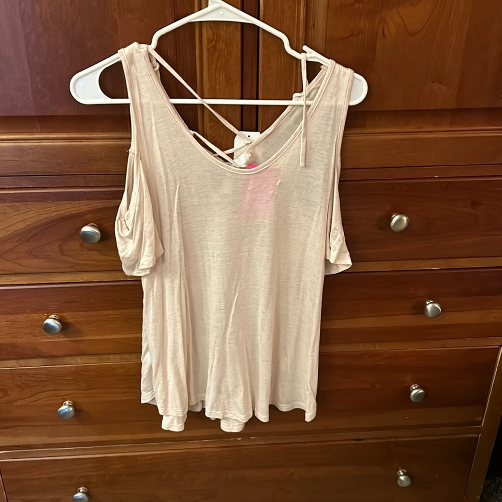 NWT cold shoulder beige tshirt. Criss cross back. Super soft and light